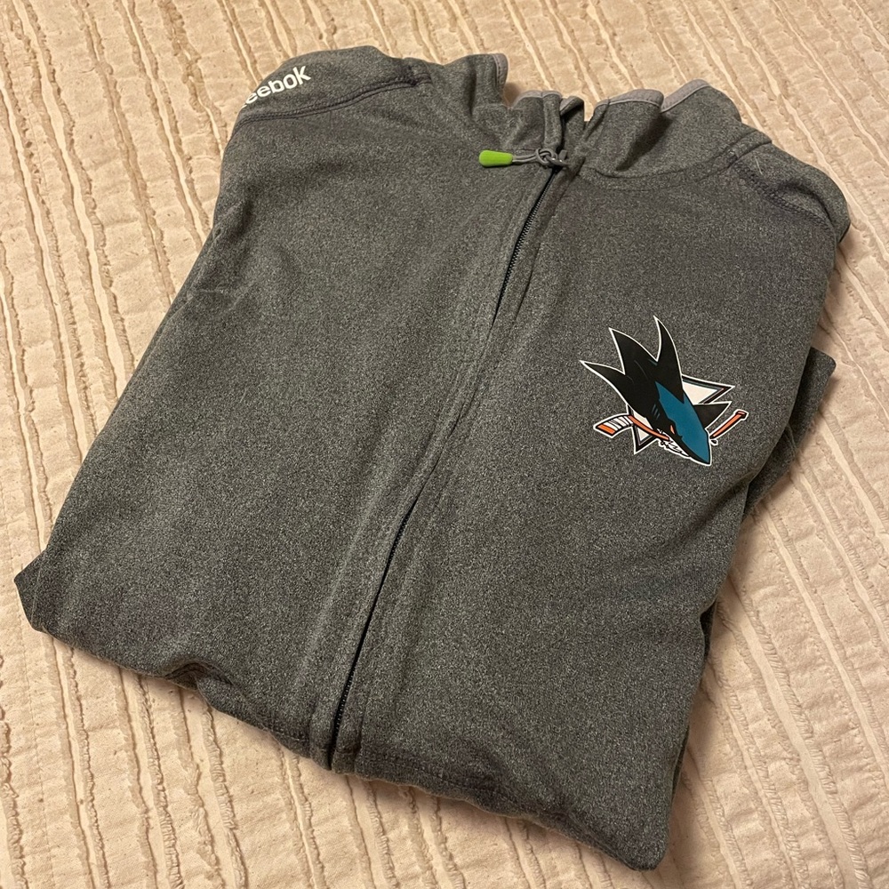 Mens Reebok NHL San Jose Sharks zip-up lightweight jacket.